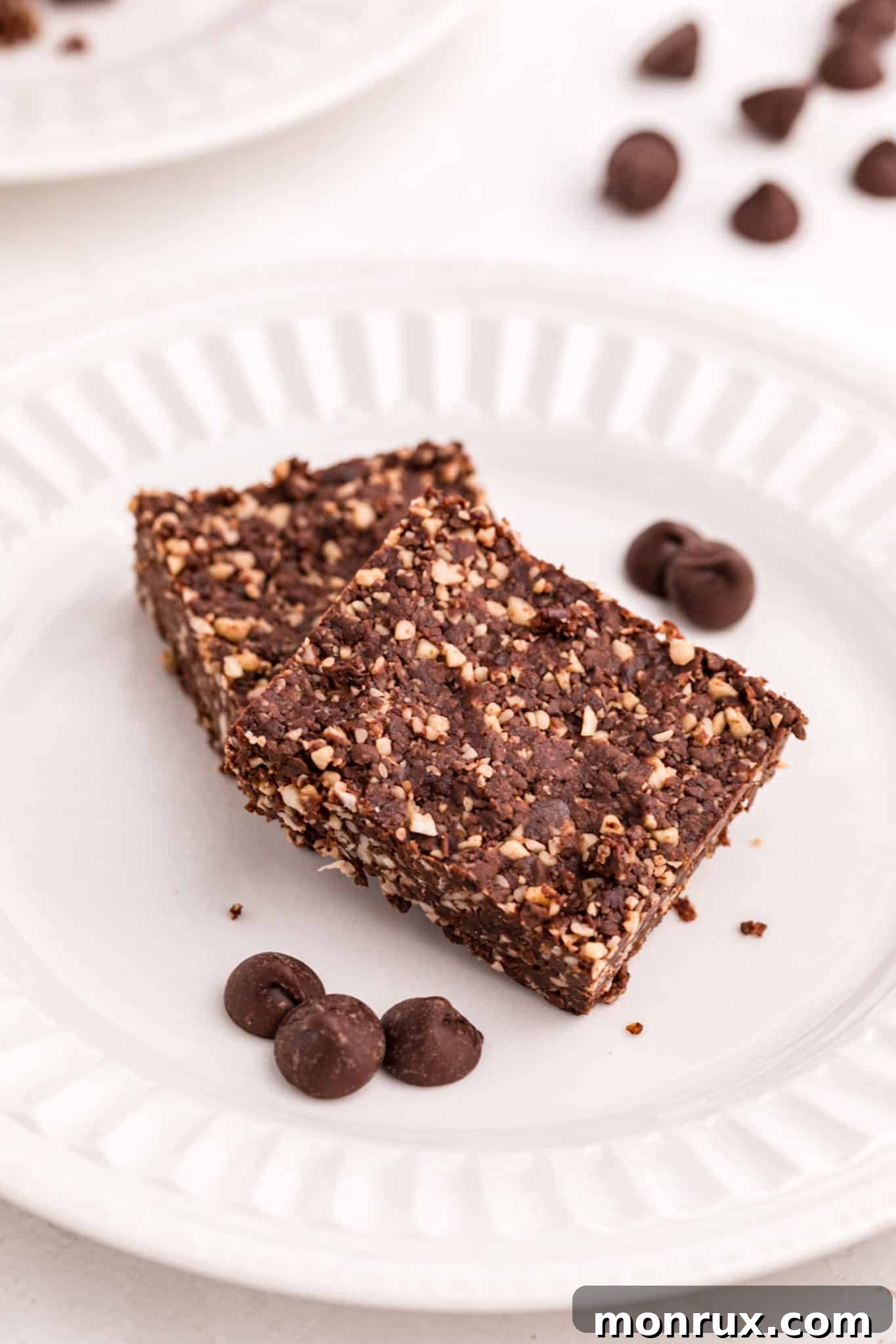 Delicious vegan no-bake brownies arranged beautifully on a plate, ready to be enjoyed.