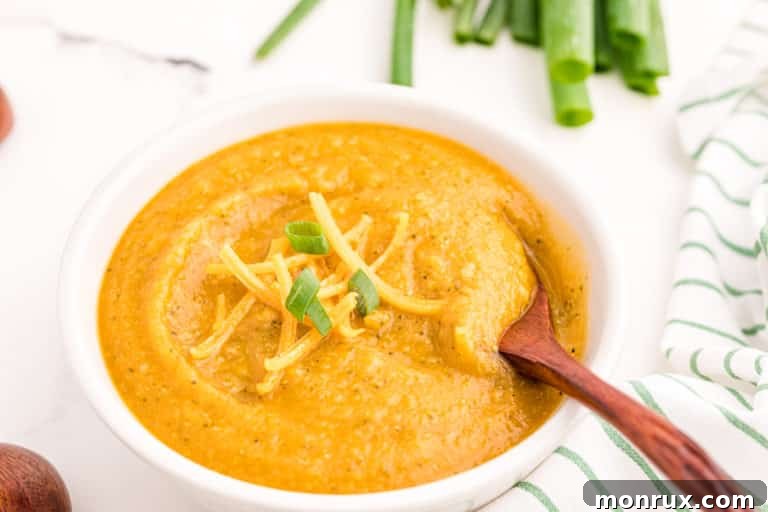 vegan broccoli potato soup in white bowl.