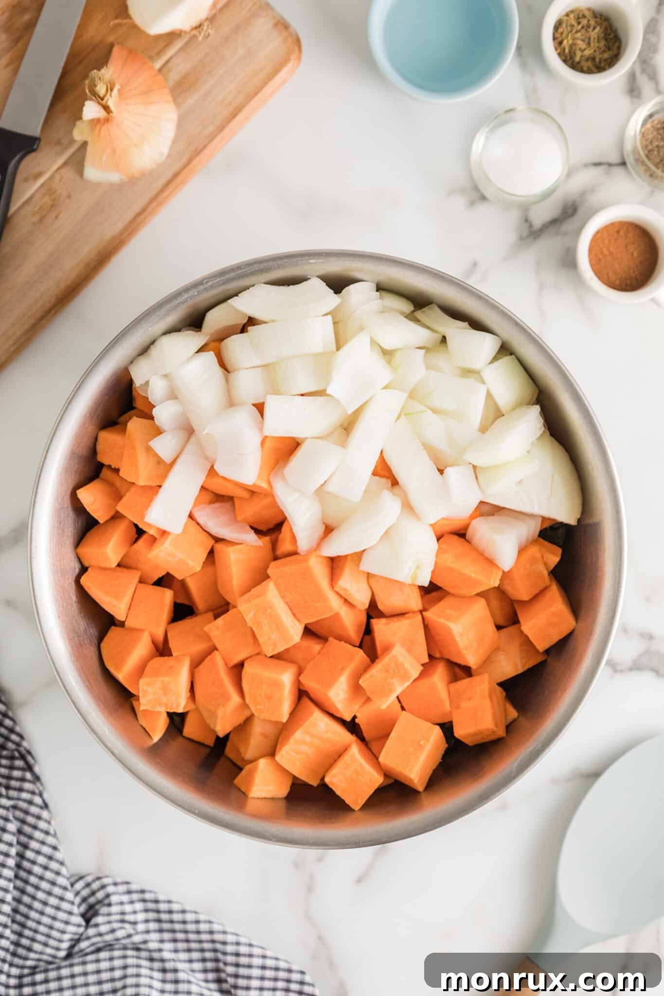 onion and sweet potato in bowl.