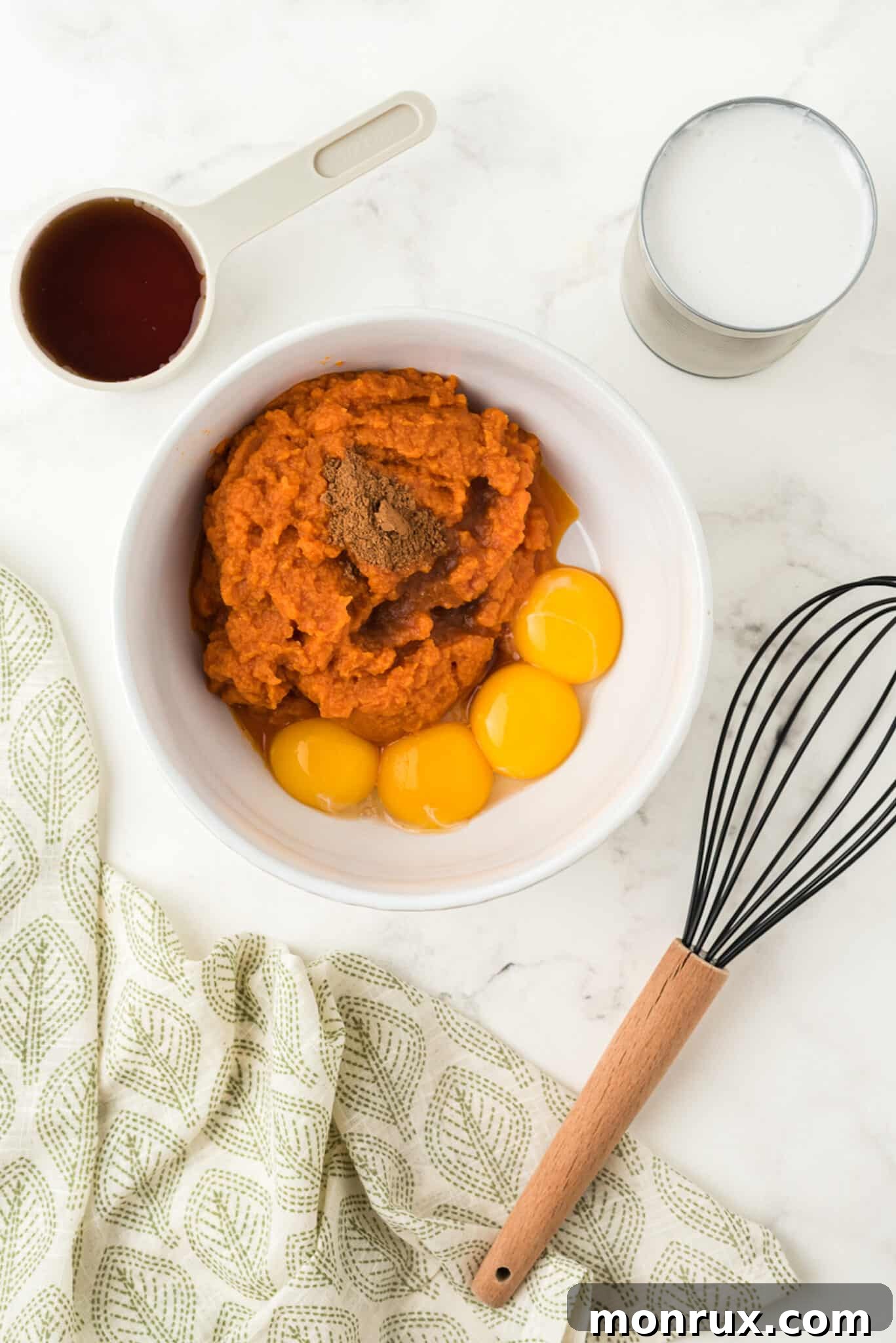 All dairy-free pumpkin pudding ingredients prepped and gathered in a mixing bowl before combining.