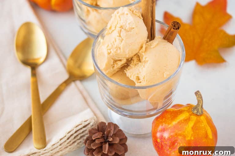 bowl of vegan pumpkin ice cream with a gold spoon, ready to be enjoyed