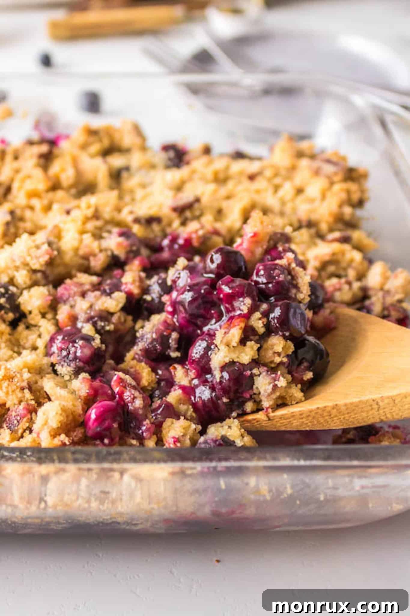 spoonful of blueberry crisp.