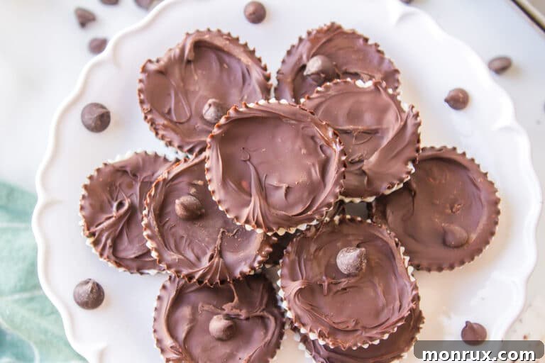 Vegan peppermint patty candies stacked on a cake plate, ready to be served and enjoyed.