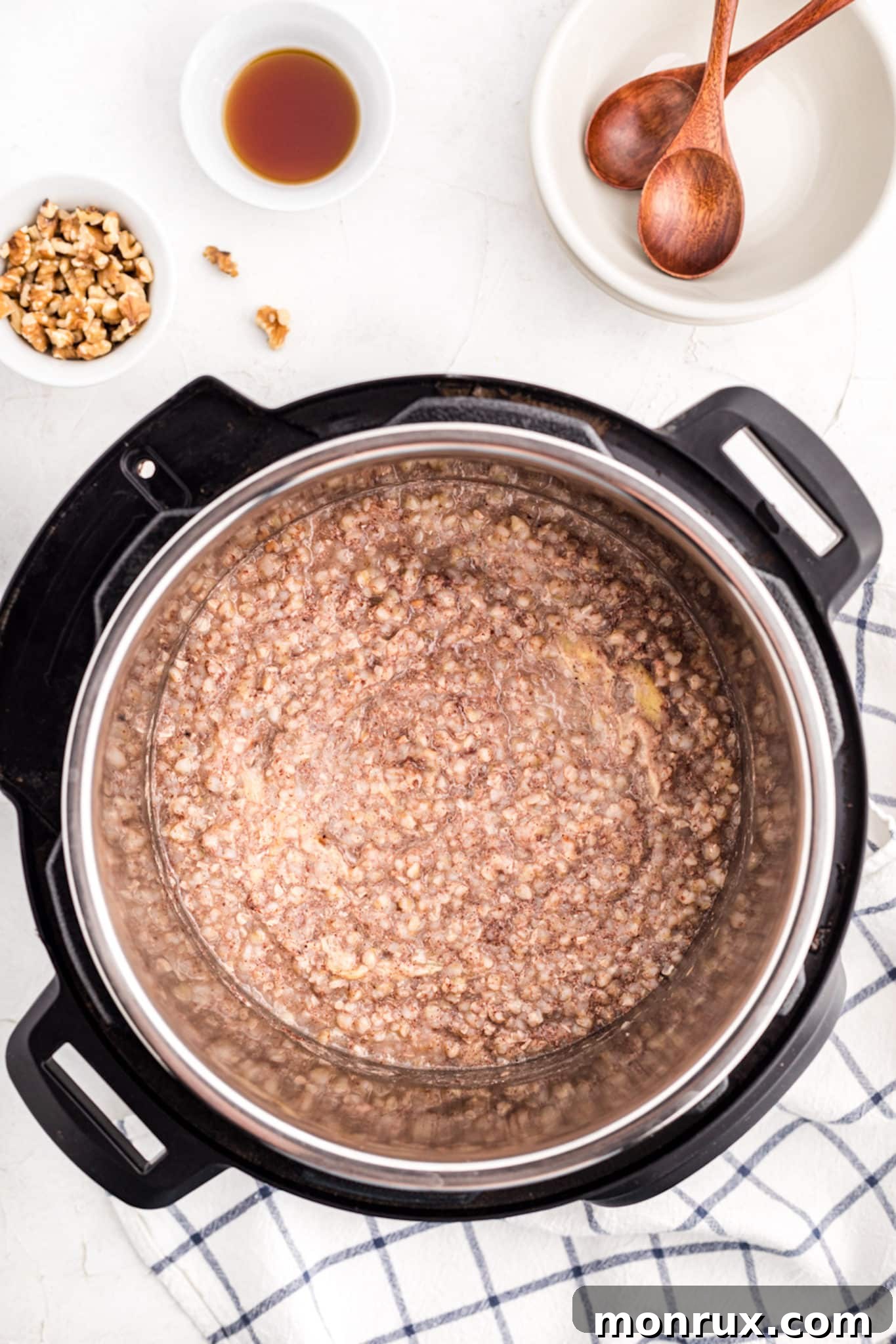 Finished buckwheat porridge in an Instant Pot, showing a creamy texture.
