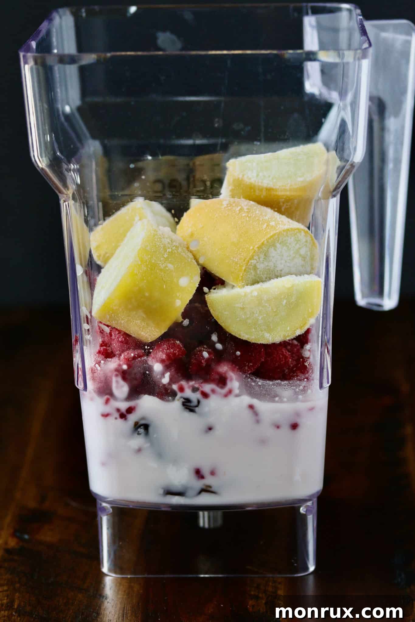 Ingredients for summer squash smoothie in a high-speed blender, ready for blending.