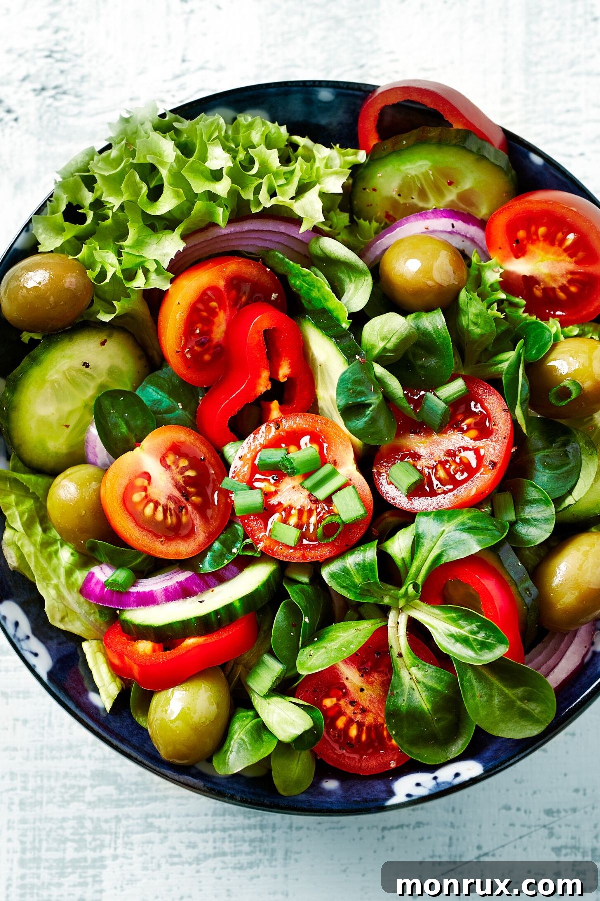 salad with fresh vegetables in bowl.