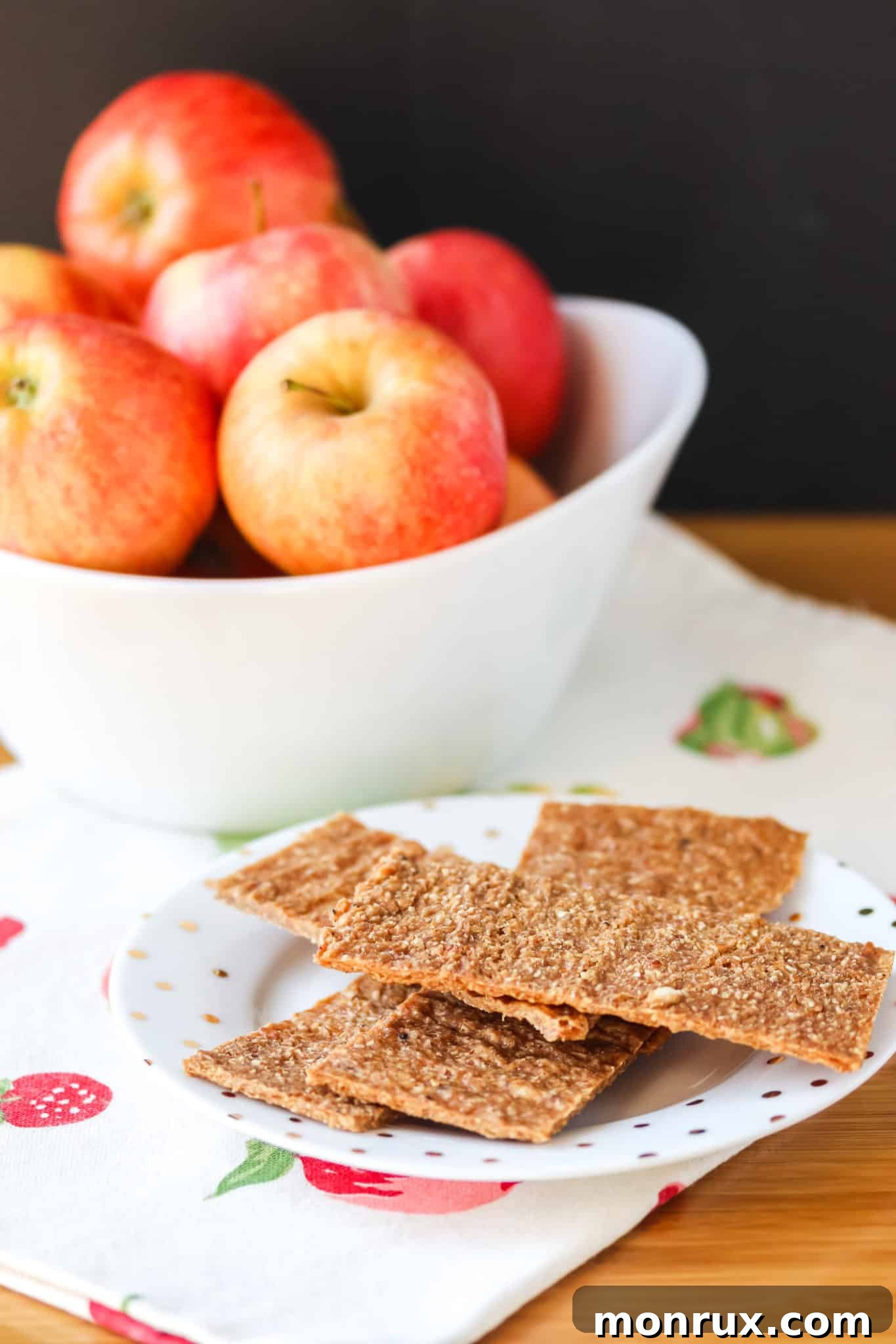 apple flax dehydrator crackers on a plate.