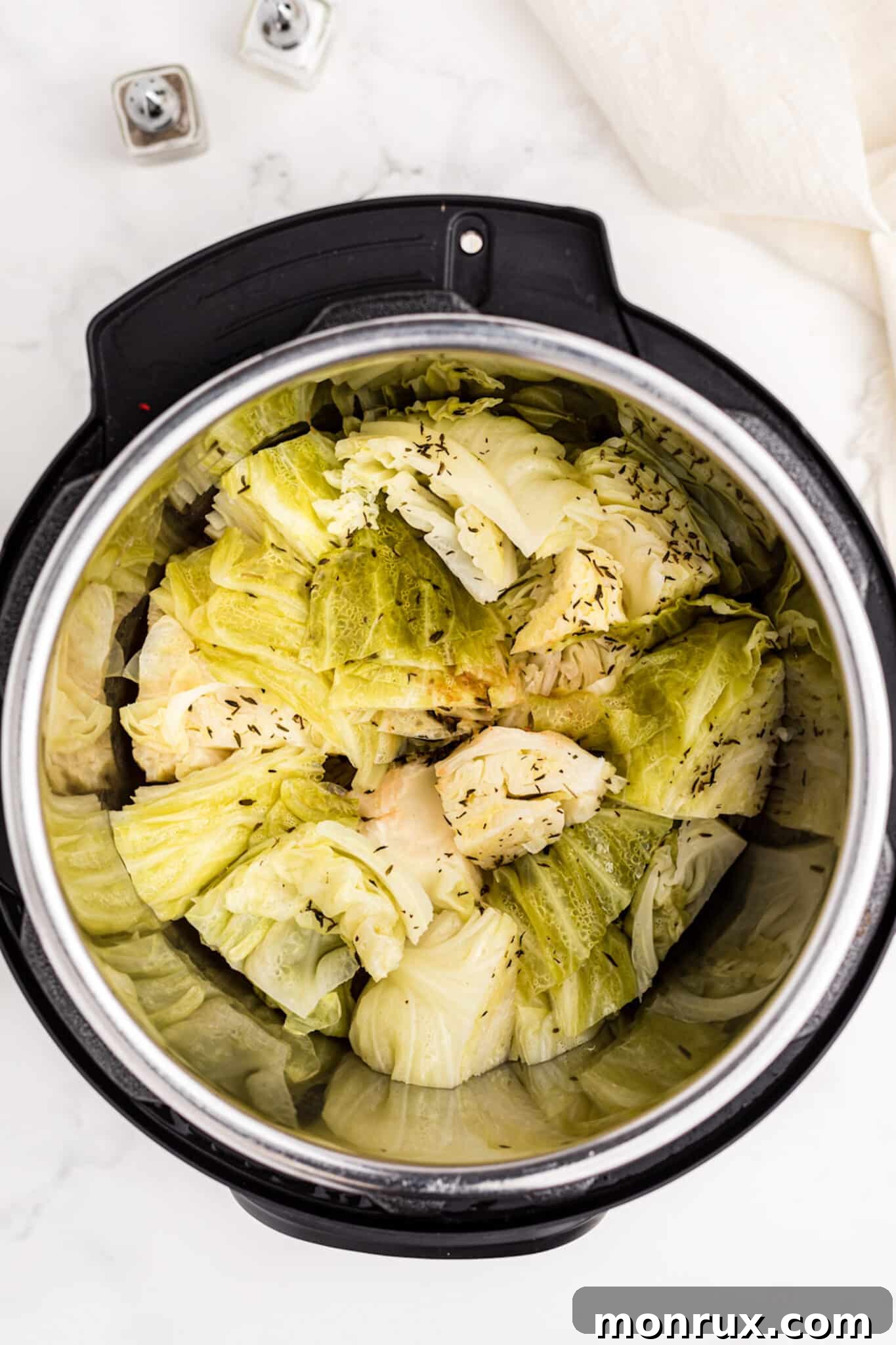 Perfectly cooked Instant Pot cabbage, glistening and ready to be served hot as a delightful side dish.