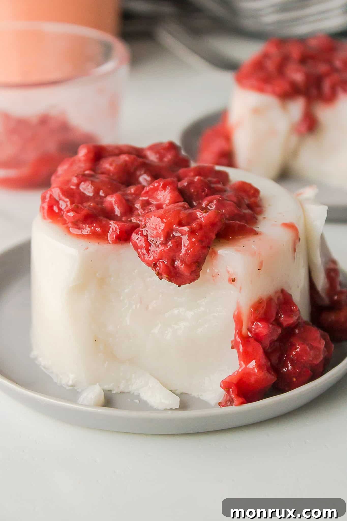 photo of panna cotta with a bite taken out of it