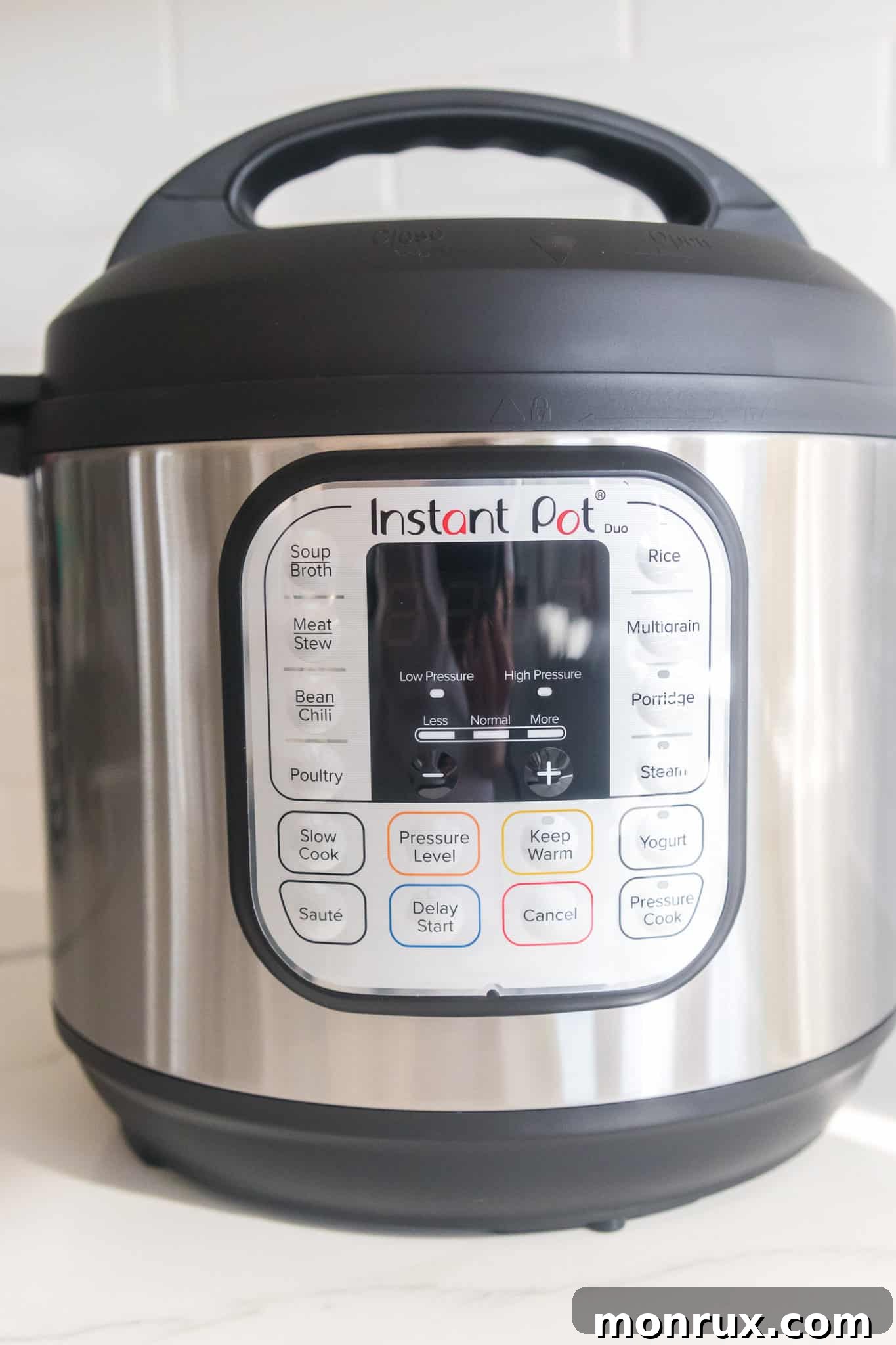 Instant Pot Duo sitting elegantly on a modern kitchen countertop, ready for use.