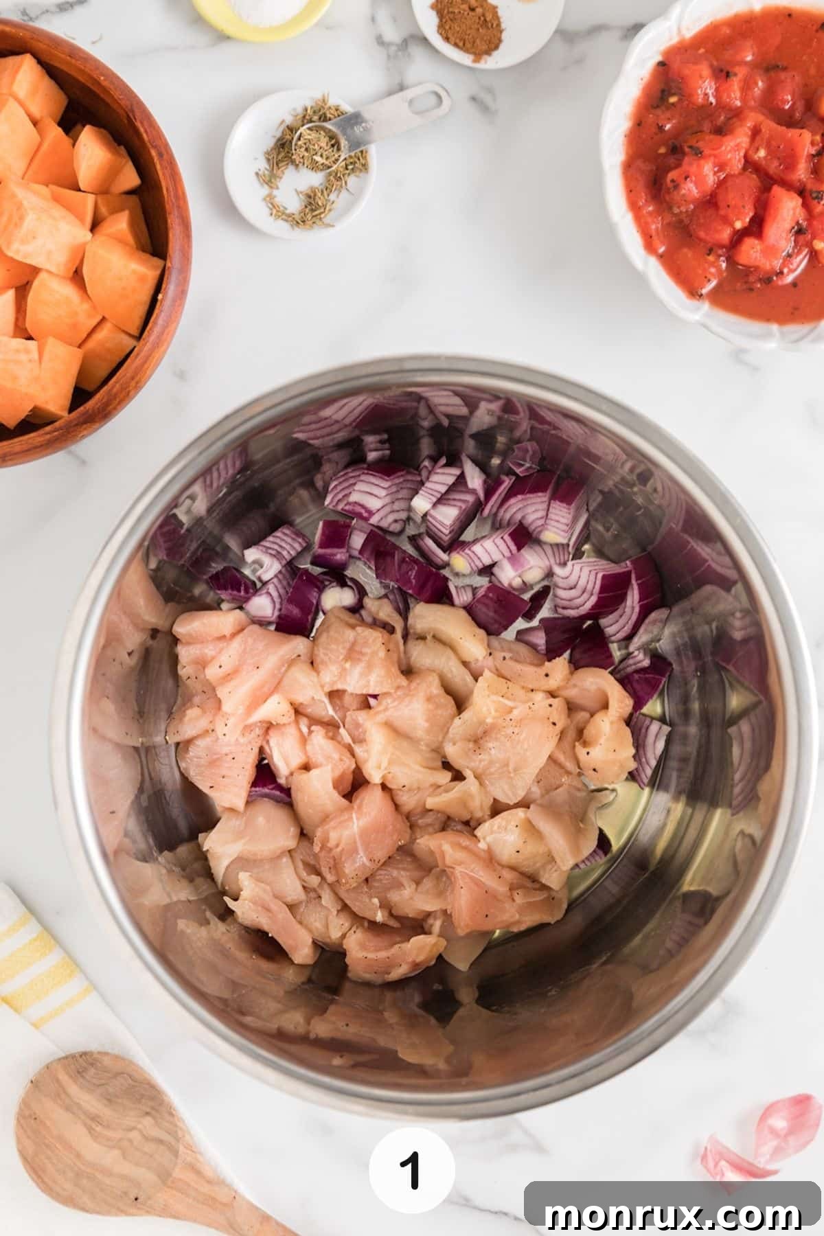 chicken and sweet potato cooking in instant pot step one, showing chicken and onion sautéing.