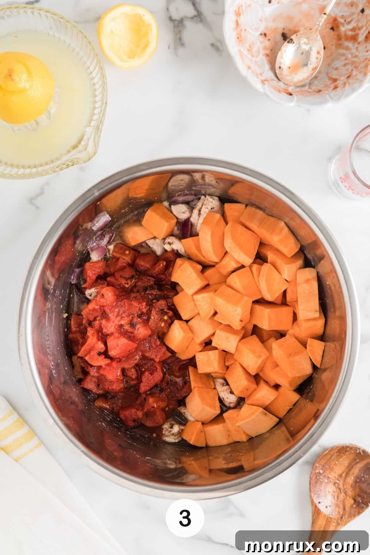 chicken and sweet potato cooking in instant pot step three, showing remaining ingredients added.