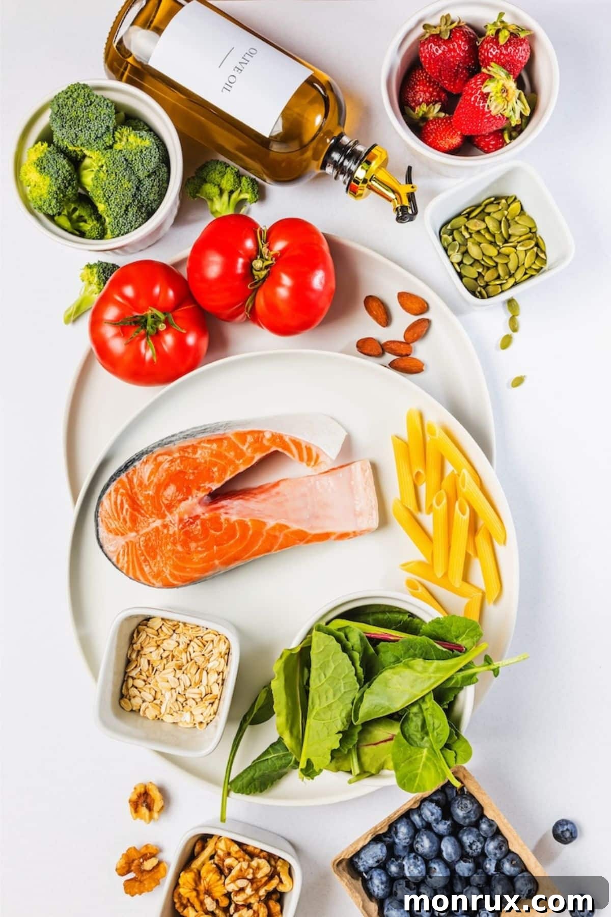 selection of anti inflammatory foods for pcos diet, including colorful vegetables, fruits, and lean proteins.