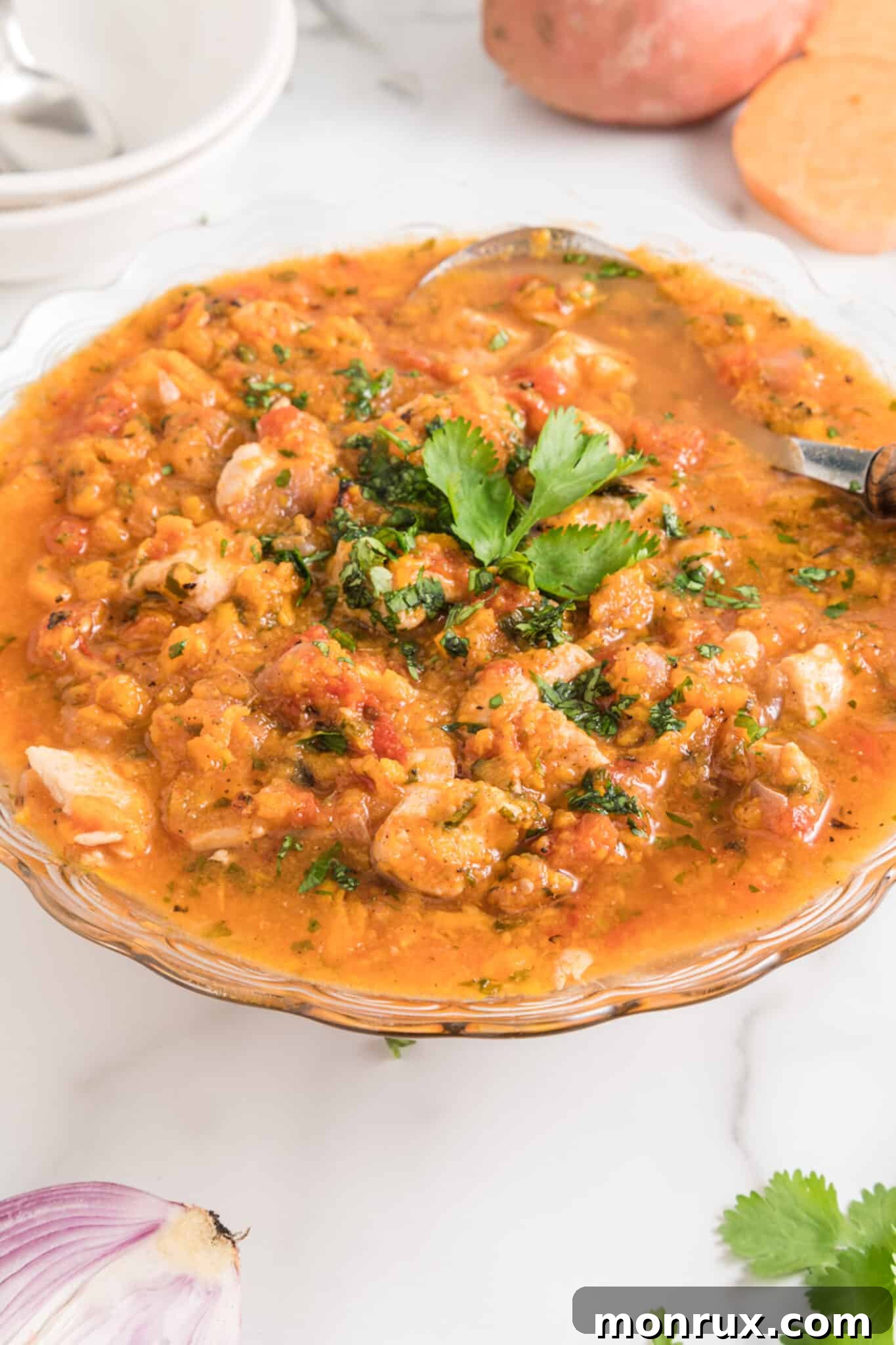 Instant Pot chicken cooked with sweet potato and herbs, showcasing a healthy and easy one-pot meal.
