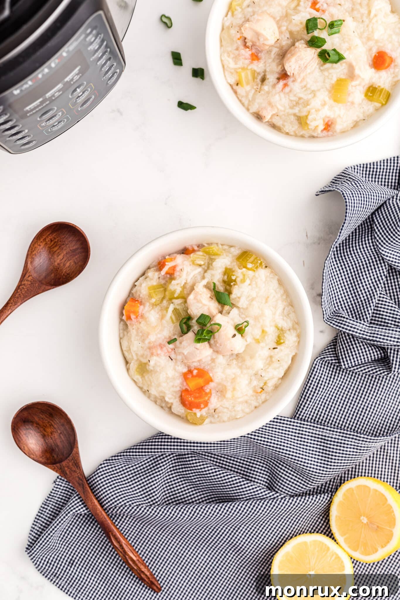 Bowls of lemon chicken rice soup served hot, ready to enjoy.