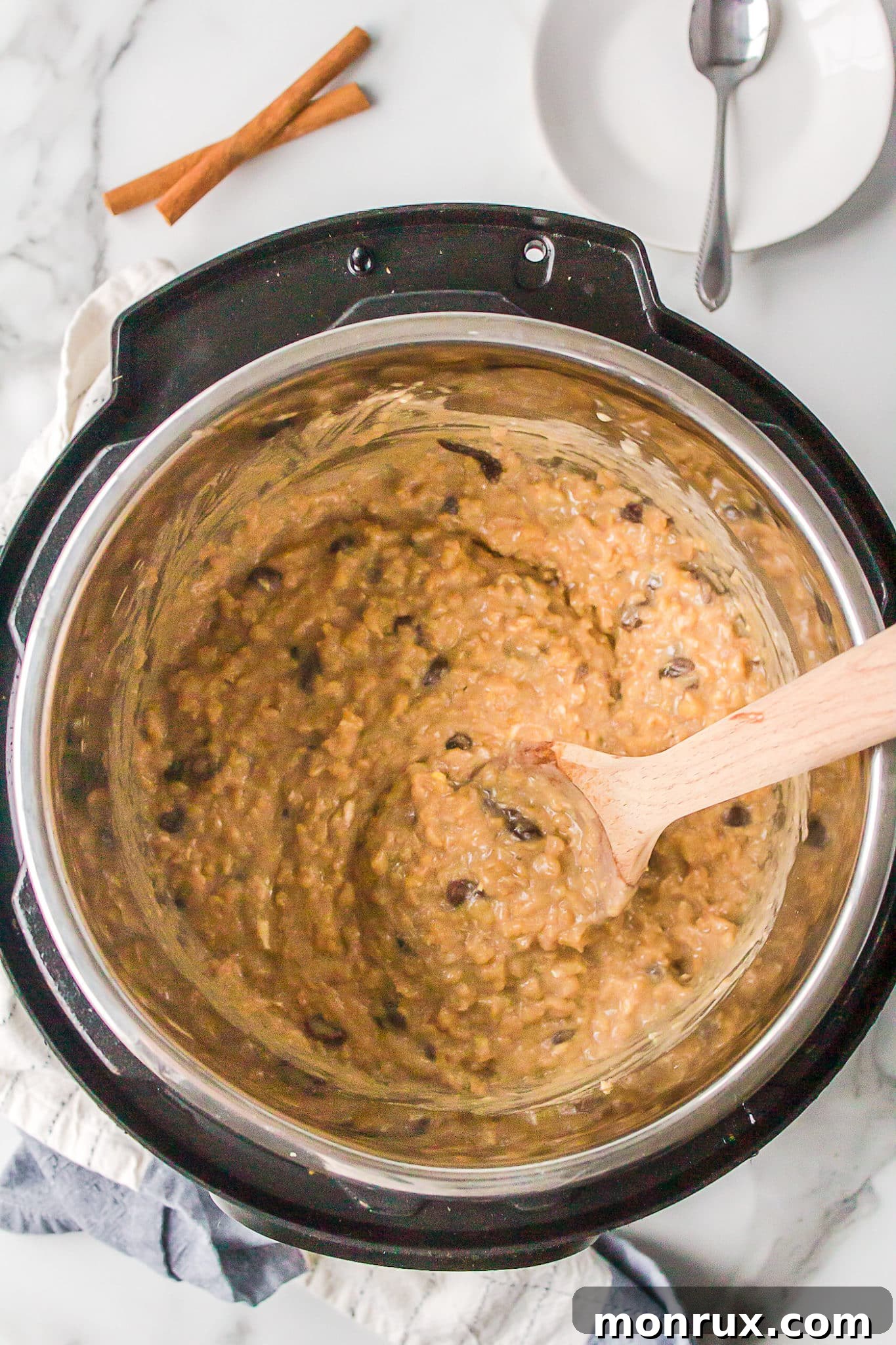 Cooked brown rice pudding inside the Instant Pot inner pot.