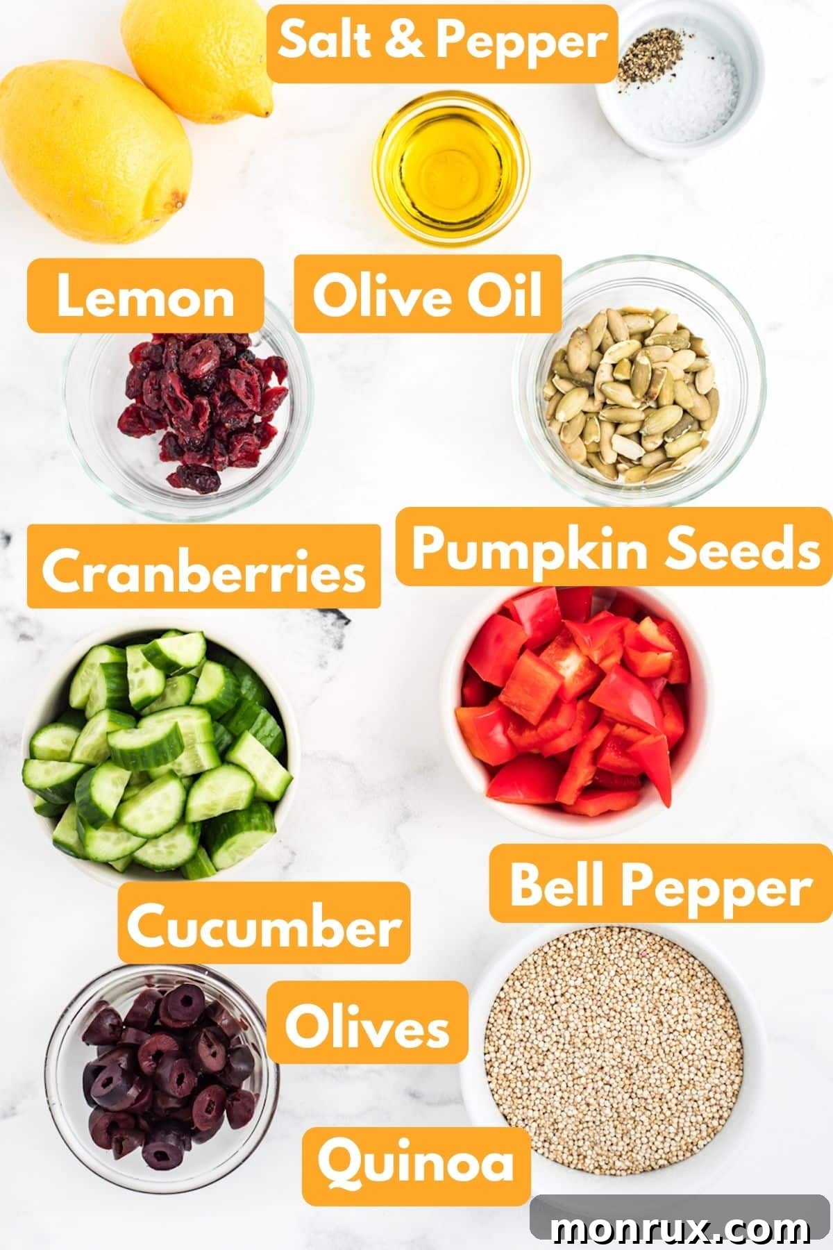 Ingredients for Mediterranean quinoa salad laid out.