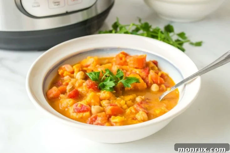 A rich and hearty Instant Pot Vegan Stew with Chickpeas, packed with vegetables.