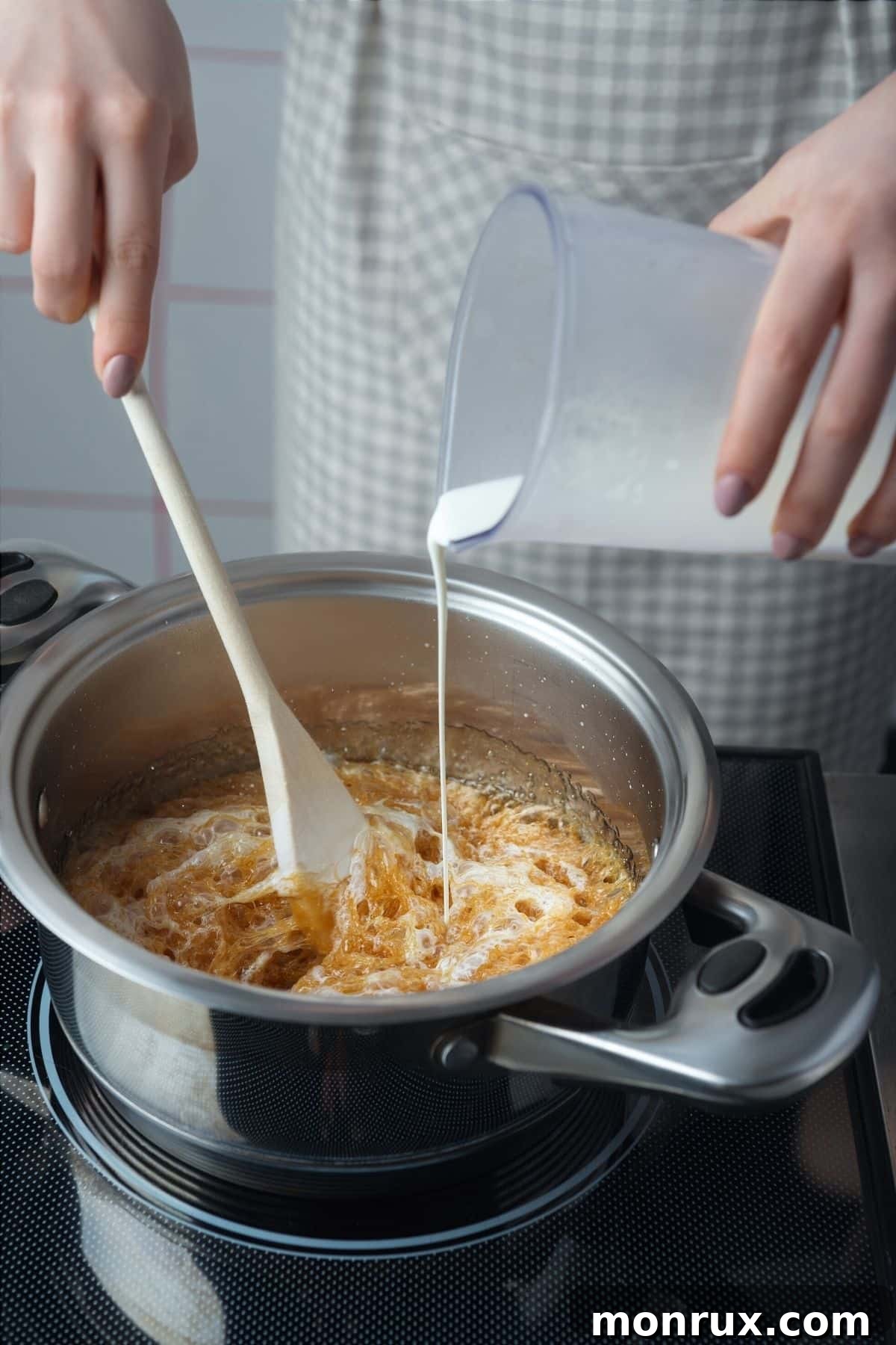cooking vegetables in a shining stainless steel pot.