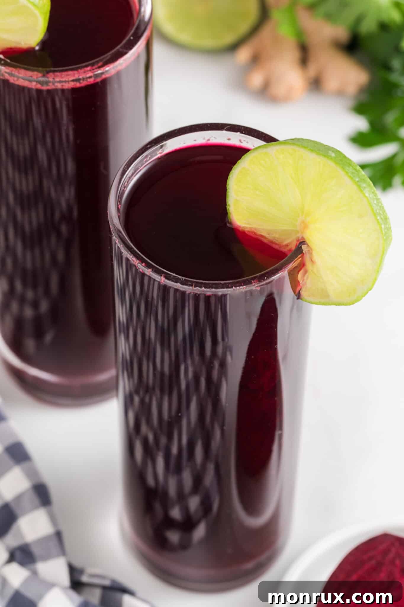 A glass of rich, dark red beet juice, inviting and refreshing.