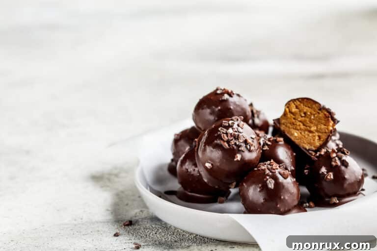 A bowl of vegan chocolate tahini truffles, ready to be enjoyed.
