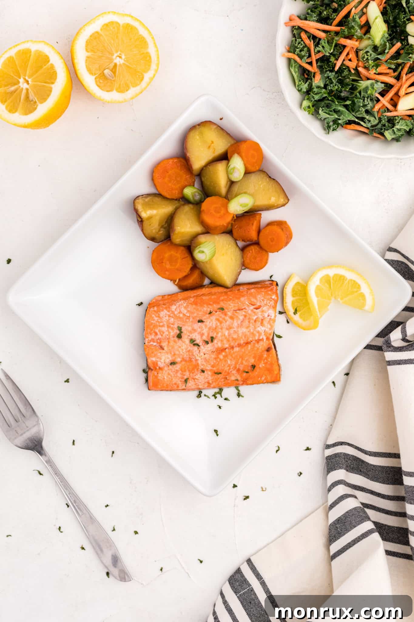plated salmon with carrots and potatoes, ready to eat