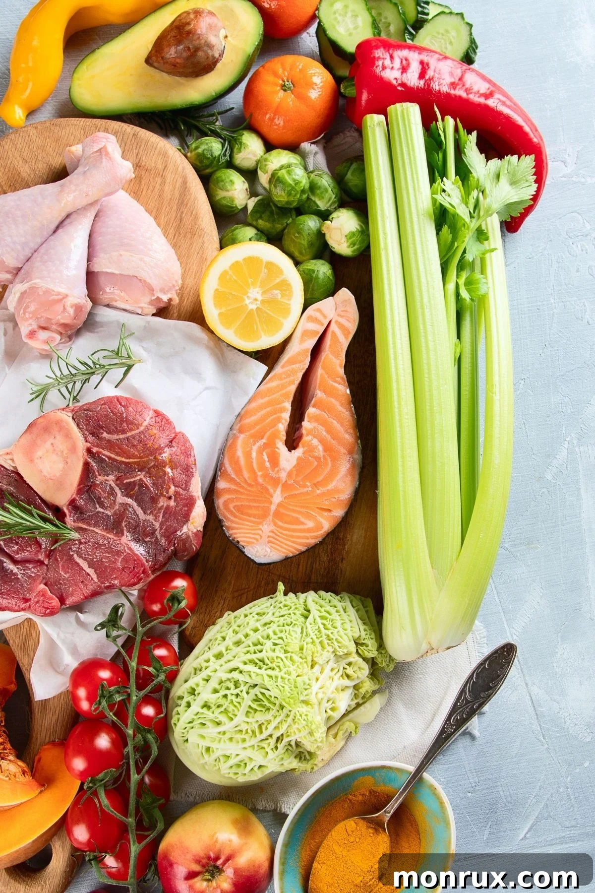 A vibrant selection of healthy Paleo-friendly foods neatly arranged on a table, including fresh vegetables, lean proteins, and healthy fats.