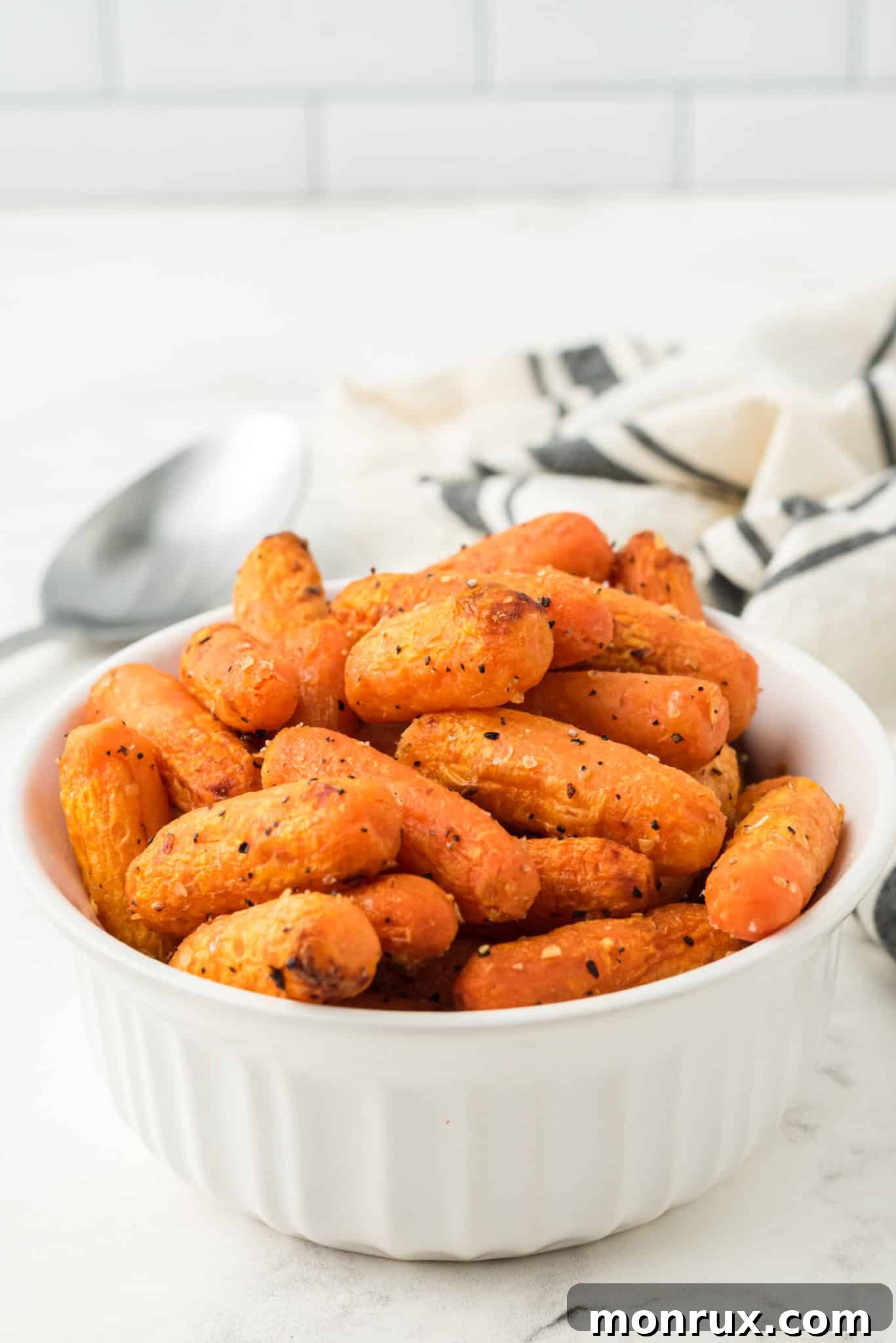 A bowl of perfectly air-fried baby carrots, ready to be served.