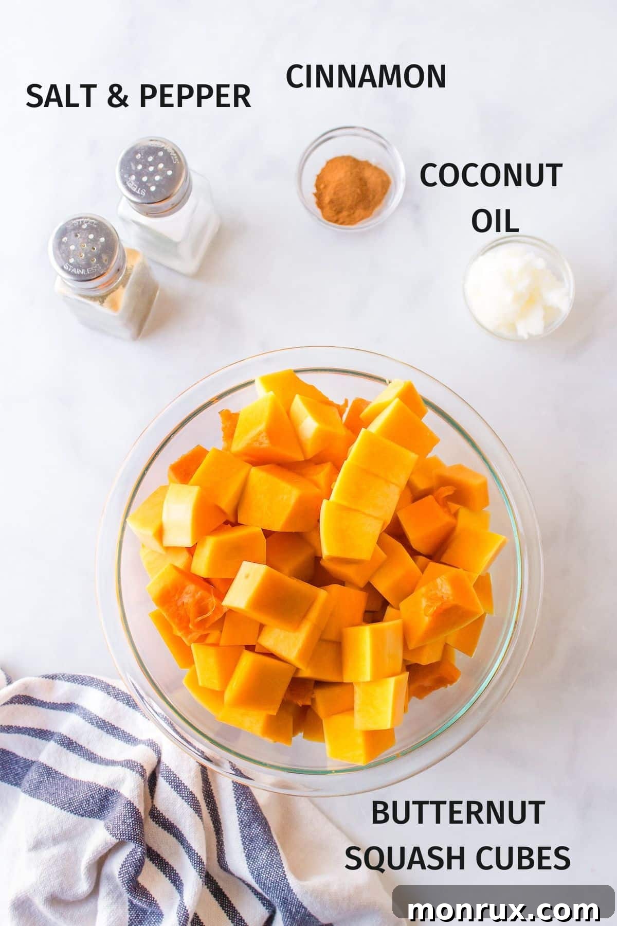 Ingredients for air fryer butternut squash cubes, laid out simply.