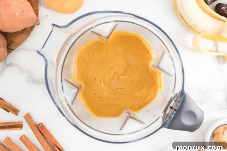 Sweet Potato Smoothie blending in a high-speed blender, showcasing the creamy texture.