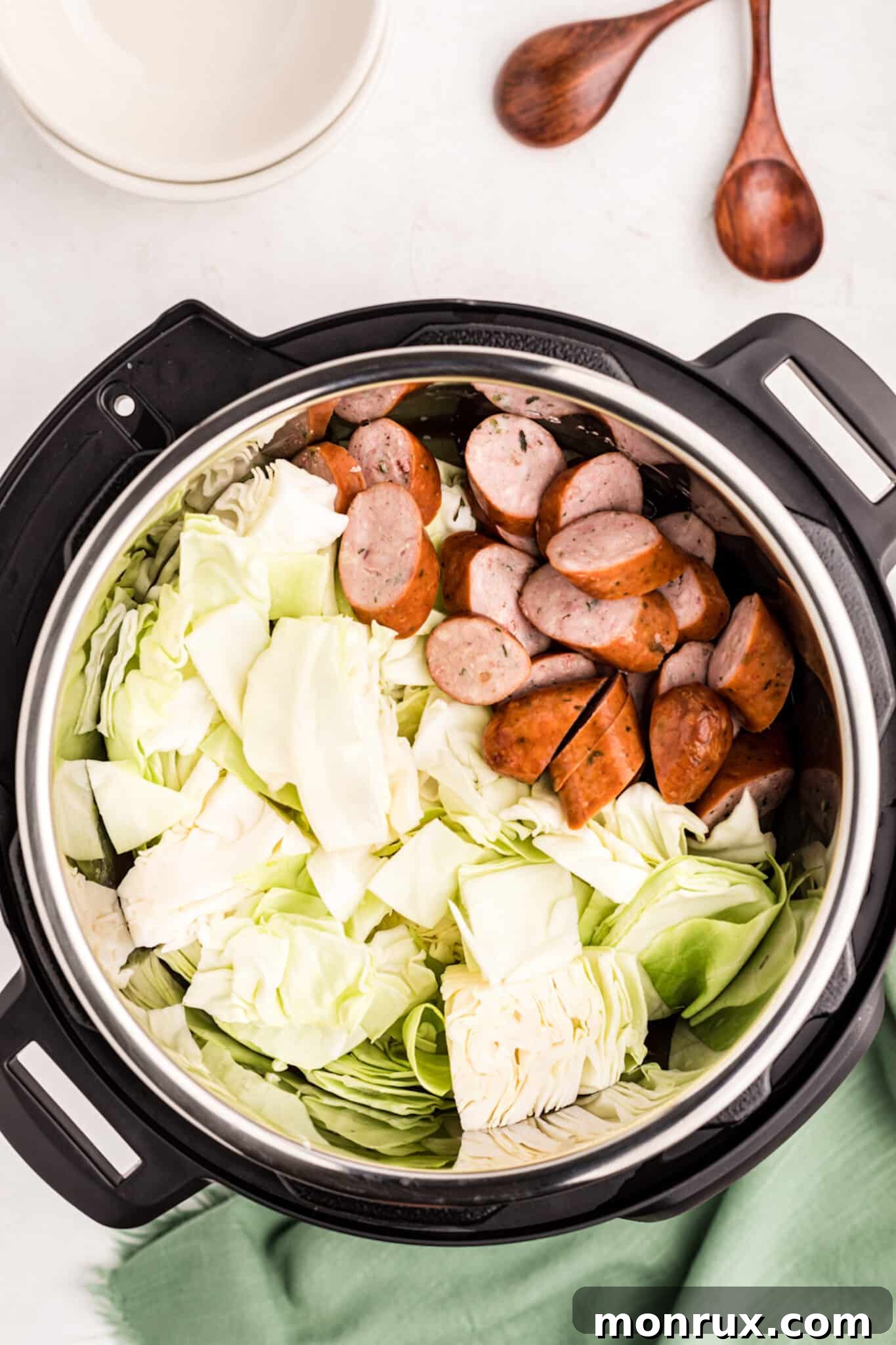 cabbage and sausage inside instant pot.