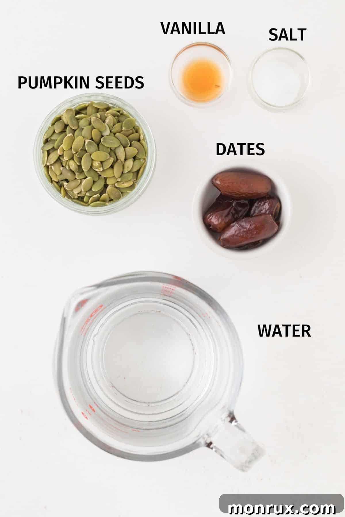 Labeled ingredients for making pumpkin seed milk: hulled pumpkin seeds, pitted dates, and filtered water.