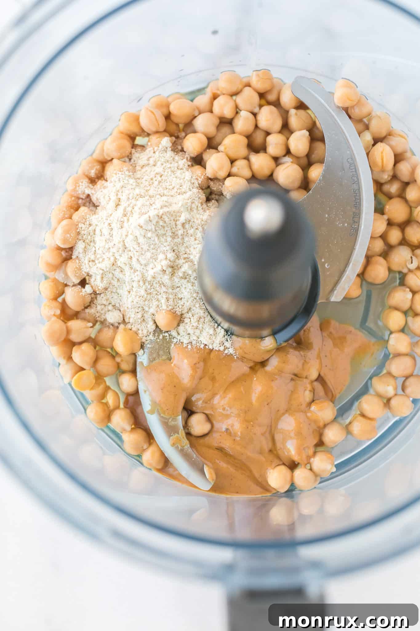 ingredients for chickpea cookie dough in a food processor.