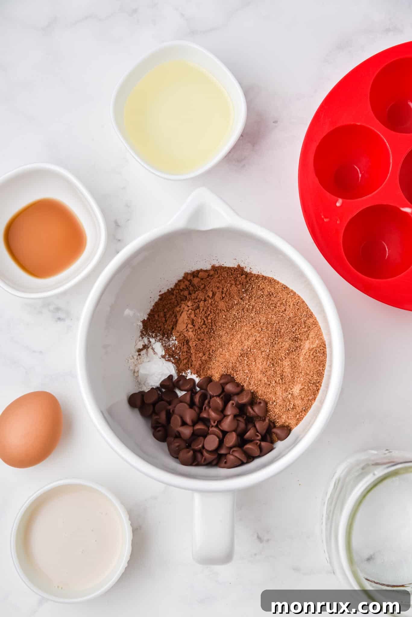 Dry ingredients for instant pot brownie bites in a mixing bowl, ready to be combined.