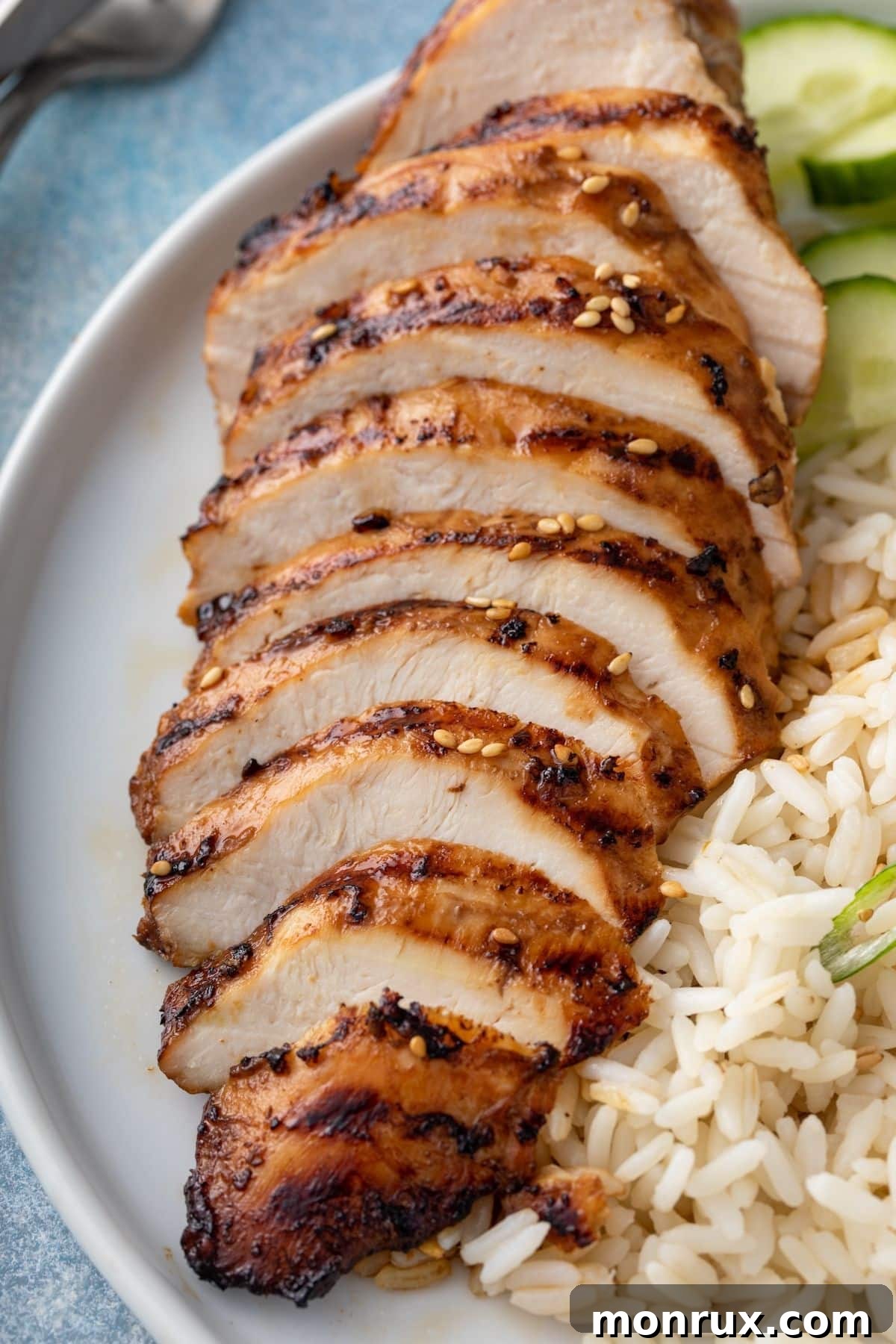 Sliced air fryer teriyaki chicken breast, ready to serve.