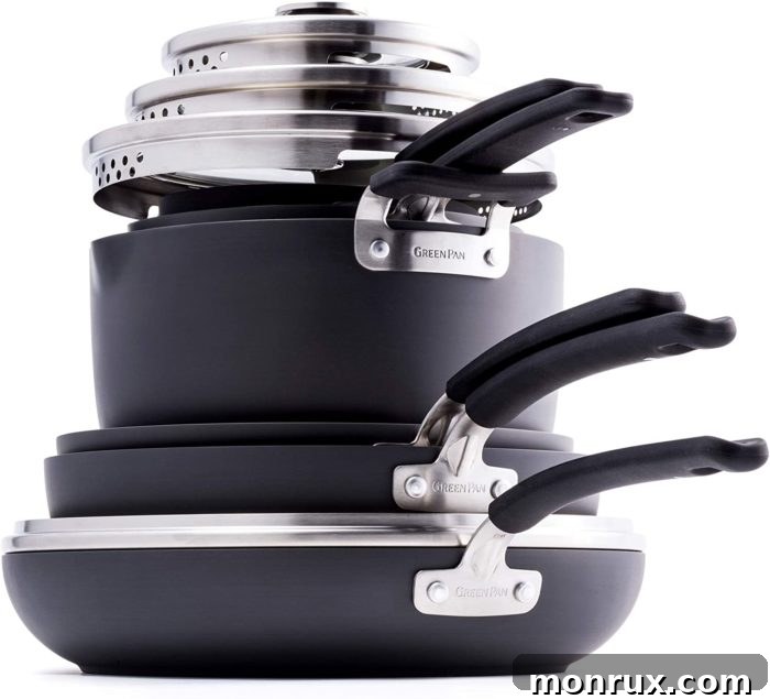 A stackable GreenPan Levels ceramic set, featuring various pots and pans designed to nest together efficiently, optimizing kitchen storage.