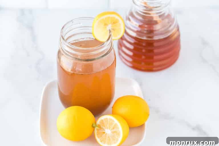 A beautifully presented photo of a mug of lemon cinnamon water on a rustic table, inviting to drink.