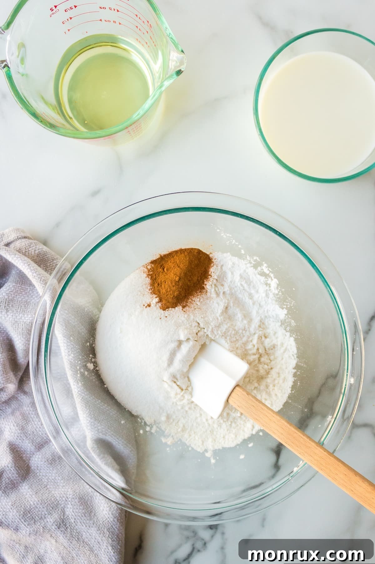 Step two: mixing almond flour, butter, and other dry ingredients for the cobbler topping.