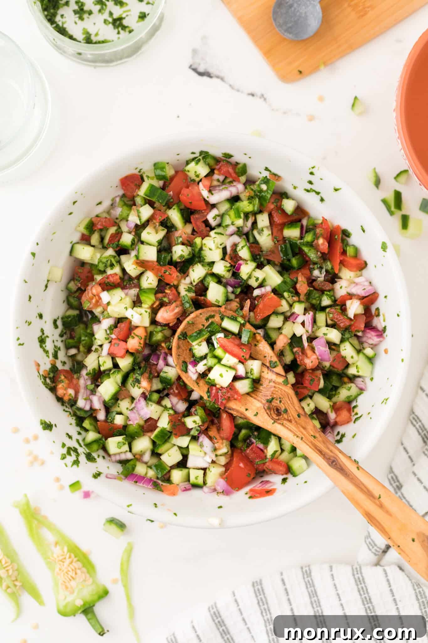 chopped ingredients in a bowl for pico de gallo recipe, after mixing.