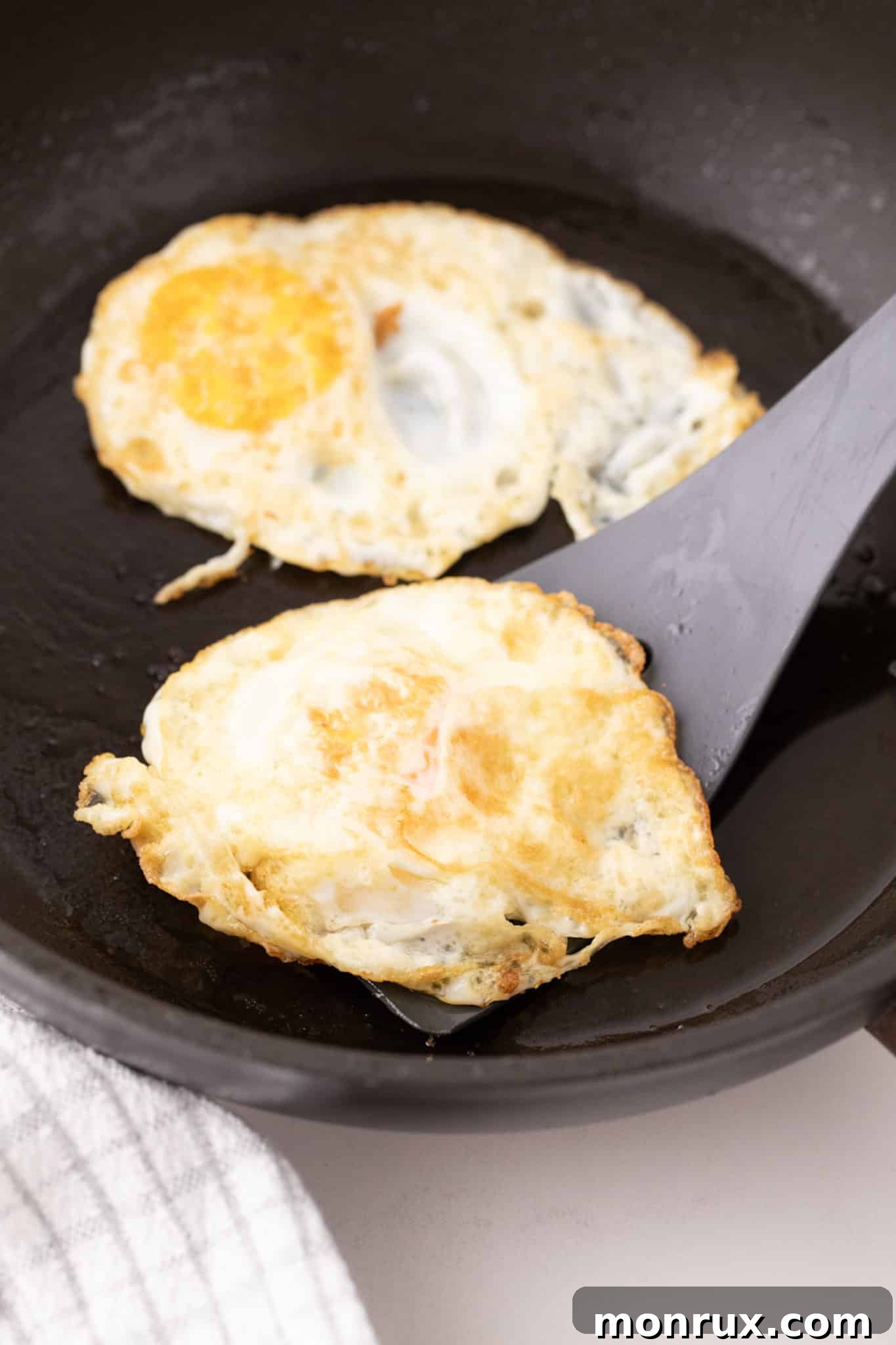over medium egg cooked in a skillet.