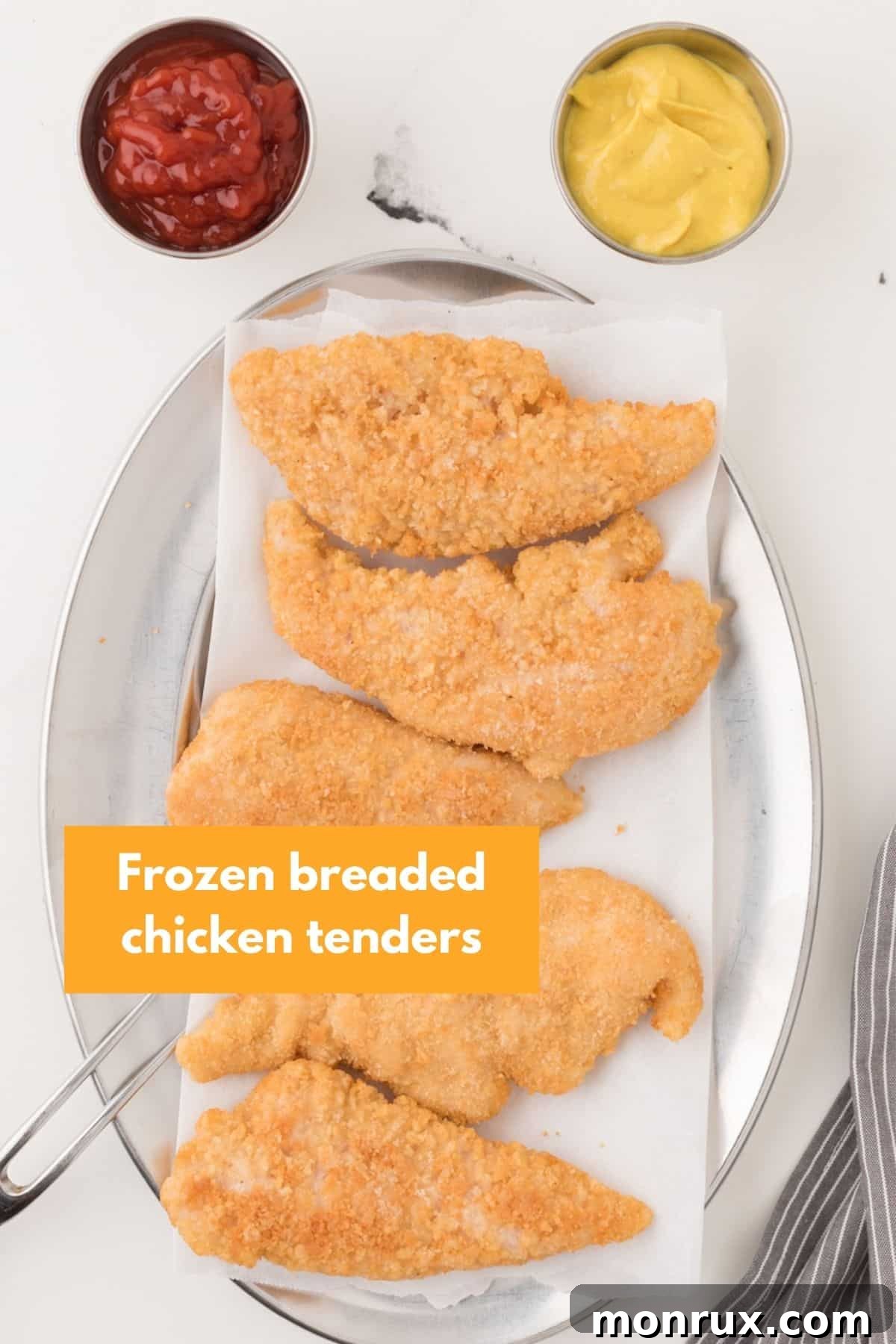 Plate of frozen breaded chicken tenders, ready for the air fryer.