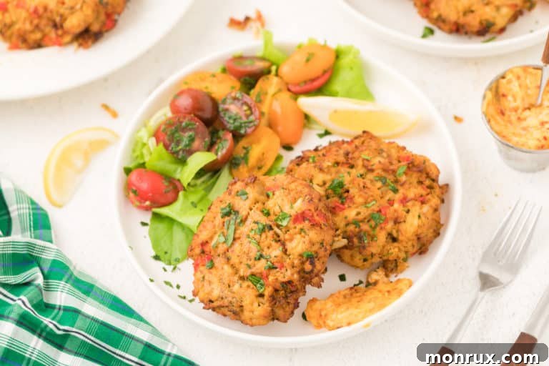 crab cakes with tomato salad