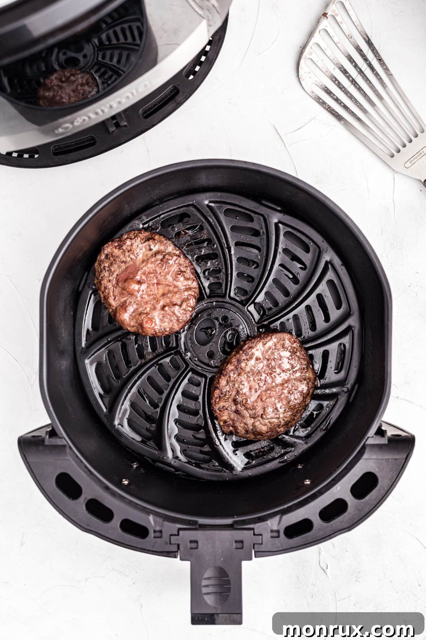 cooked hamburgers in an air fryer.