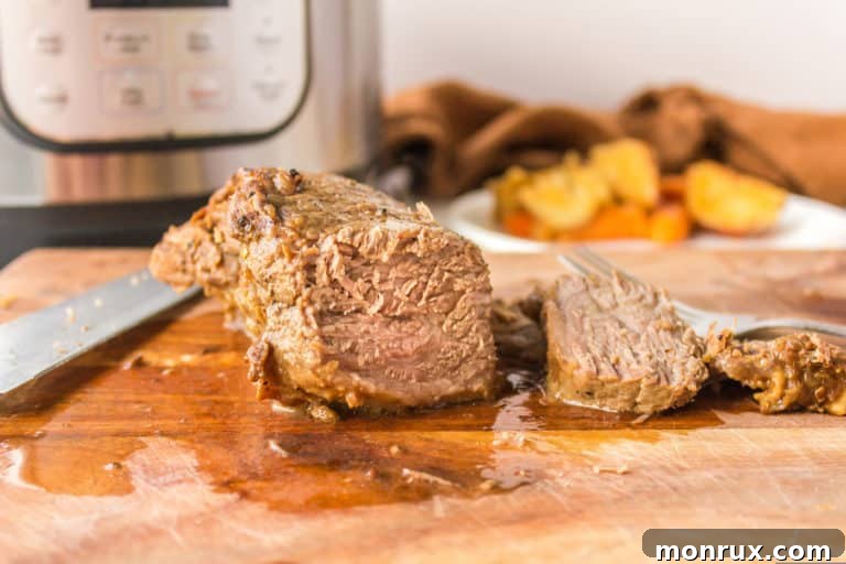 sliced tri tip on a cutting board