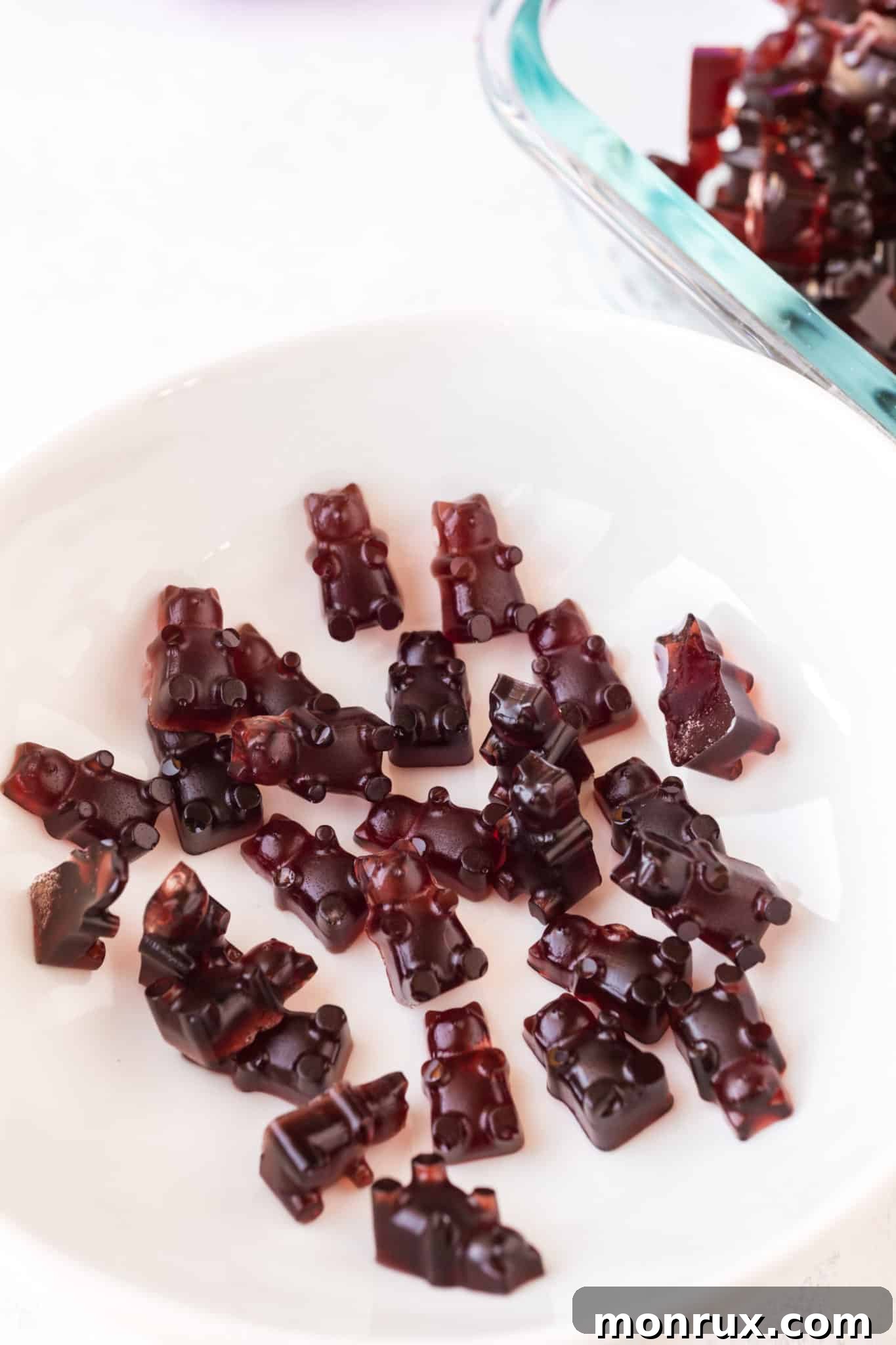 A delightful collection of homemade paleo gummy bears, showcasing their vibrant colors and healthy appeal.