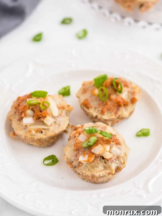 Delicious turkey meatloaf muffins, perfectly baked and served on a plate, ideal for a protein-rich snack or meal.