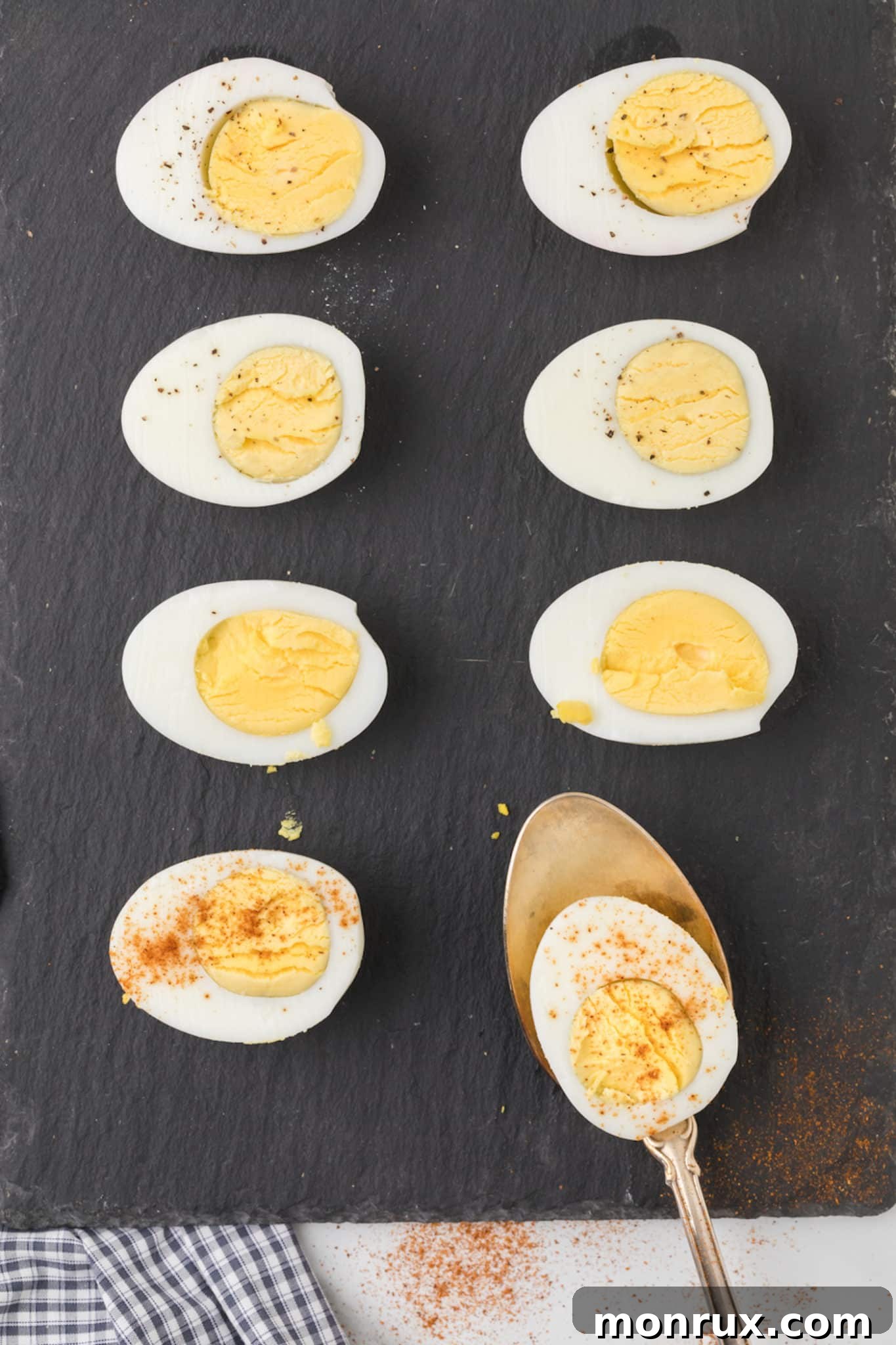 Perfectly cooked hard-boiled eggs, still in their shells, ready to be peeled and enjoyed as a quick snack.
