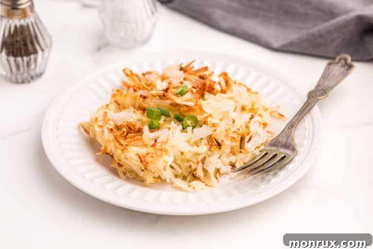 Deliciously crispy air fryer hash browns, golden brown and ready to serve.