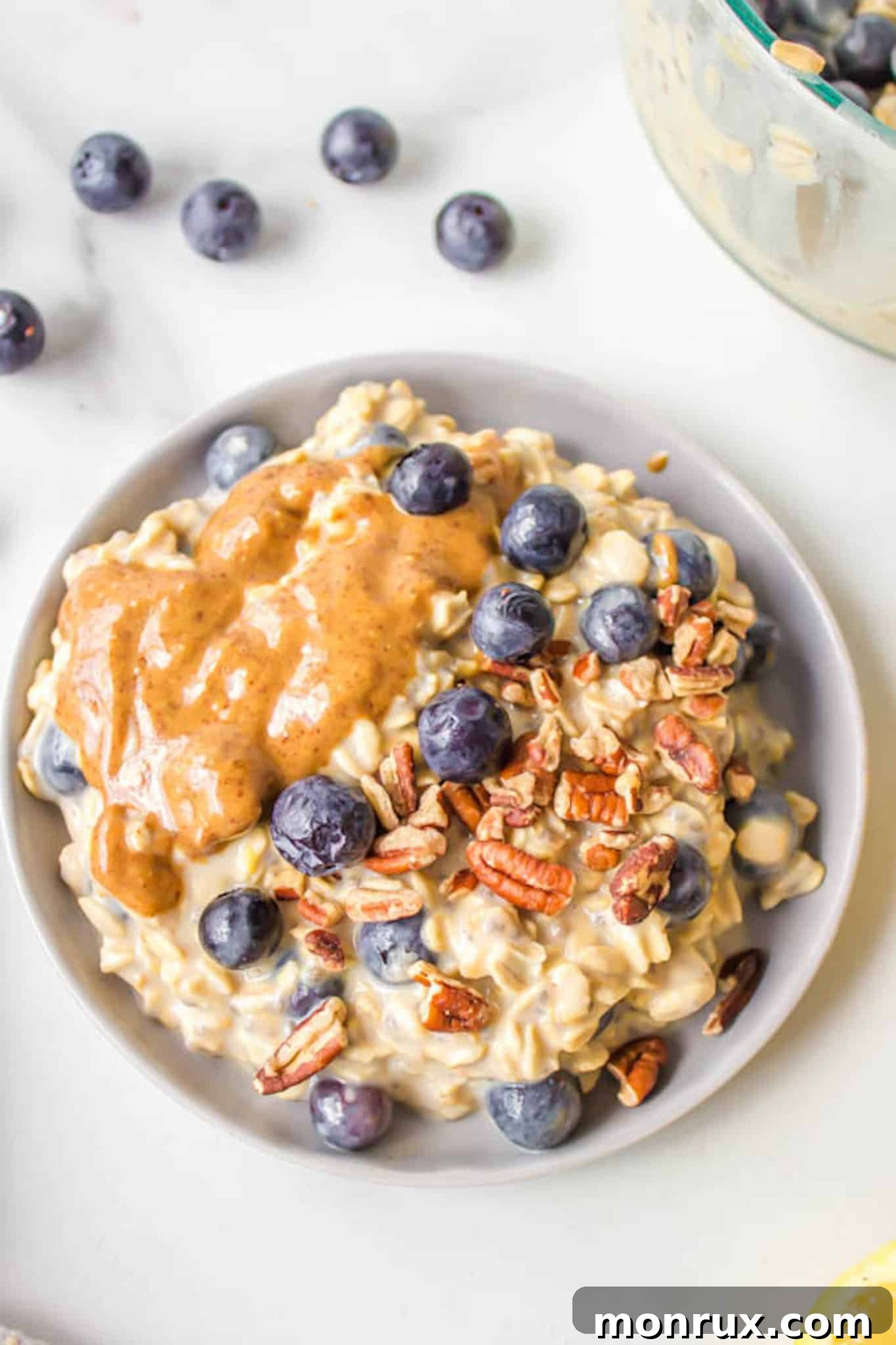 overnight protein oats with blueberries and nut butter.