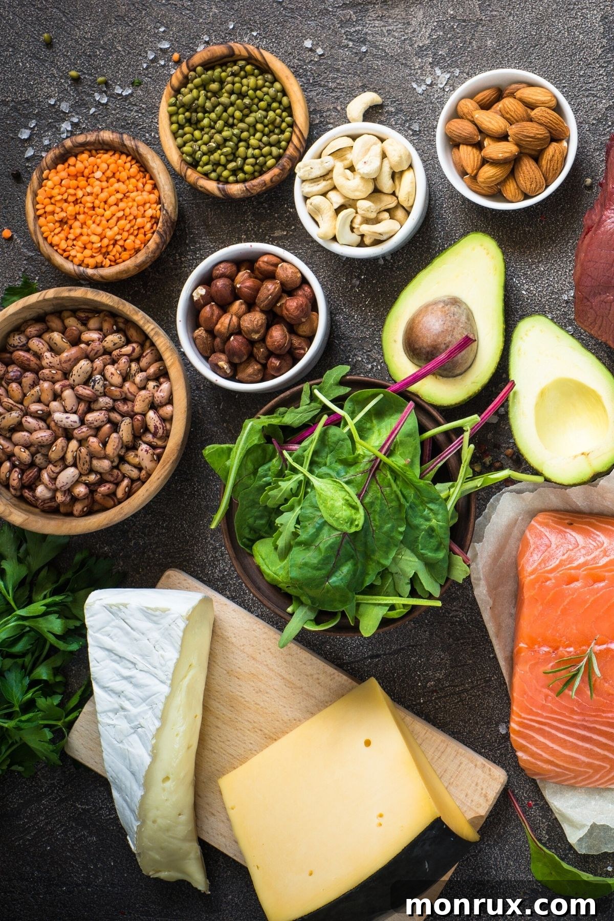 A vibrant selection of whole food protein sources, including eggs, nuts, and vegetables, arranged on a table.